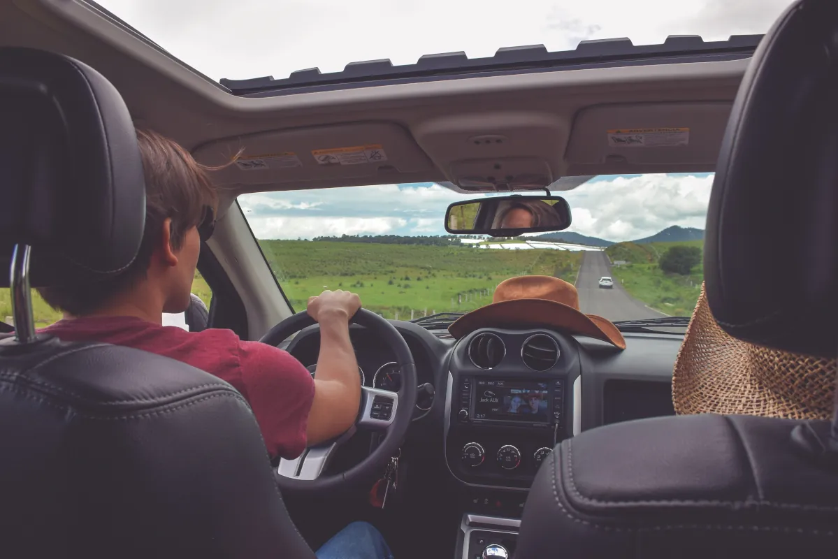 Car sunroof open and driving