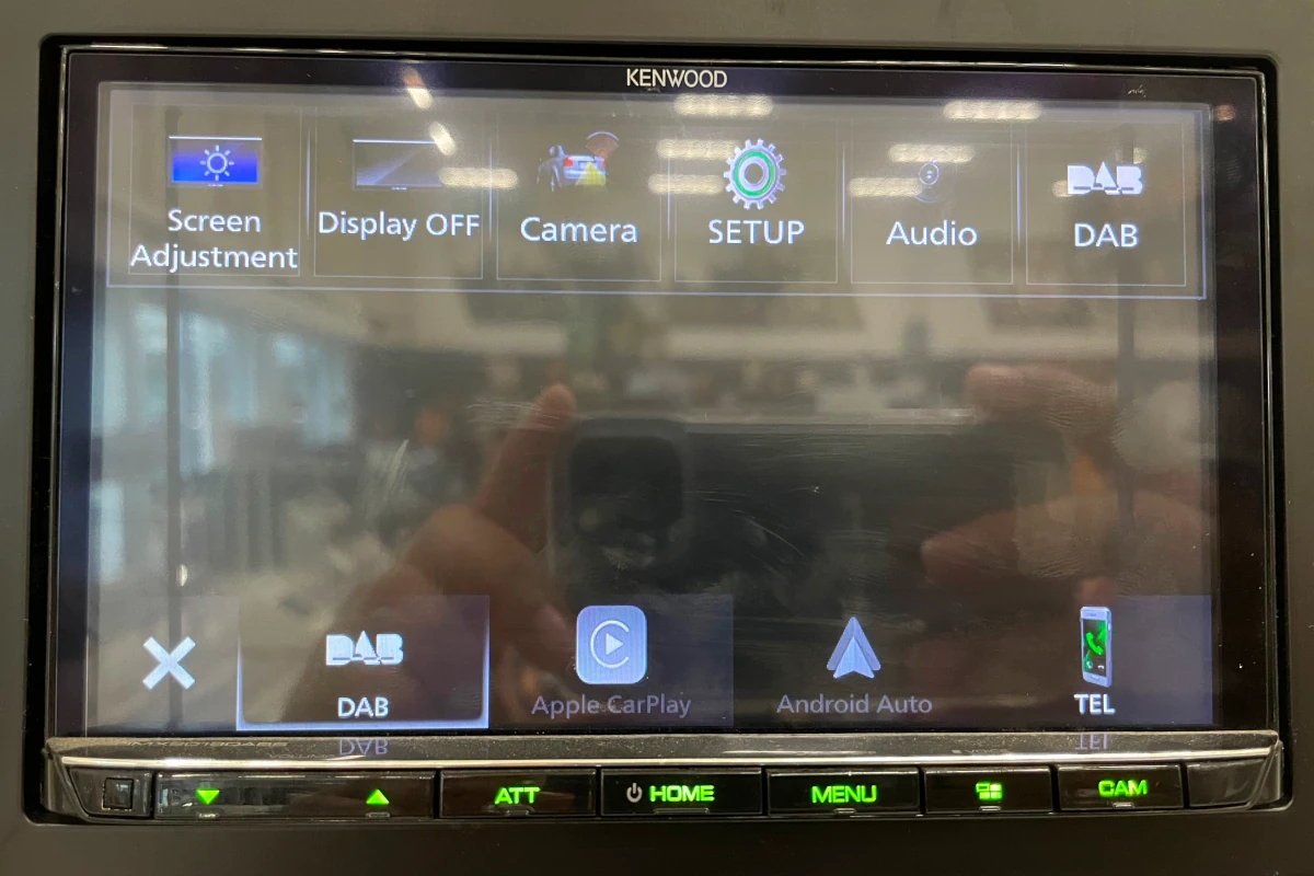 Double din Kenwood head unit with a touchscreen display showing menu options