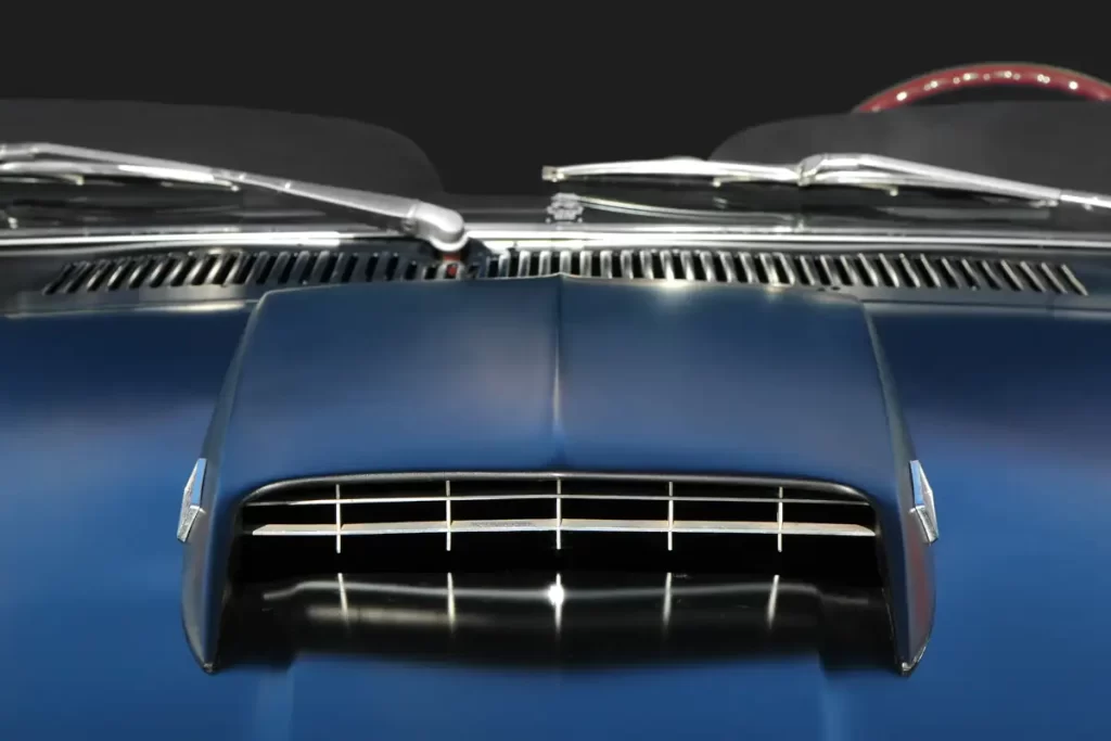 Blue classic muscle car hood vent
