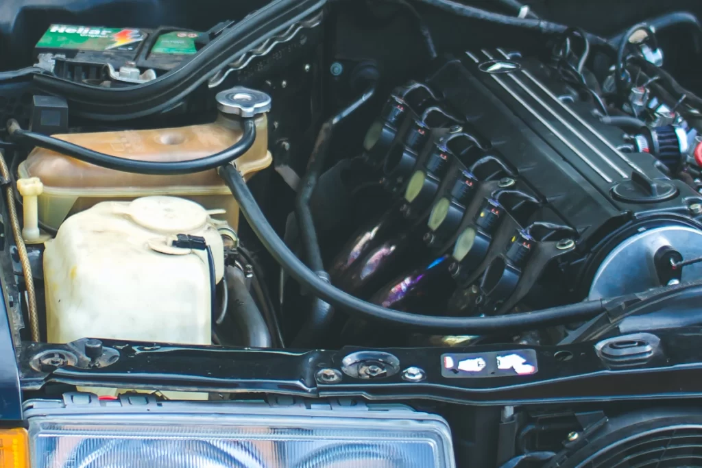 Car exhaust manifold connected to the engine