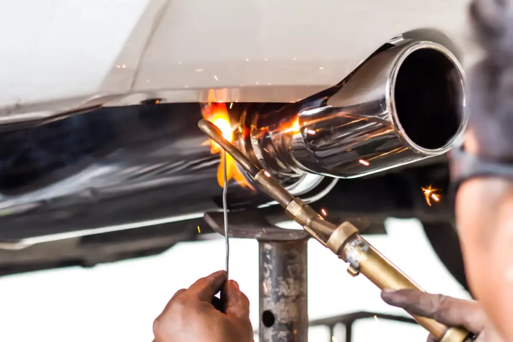 White car exhaust pipe welding