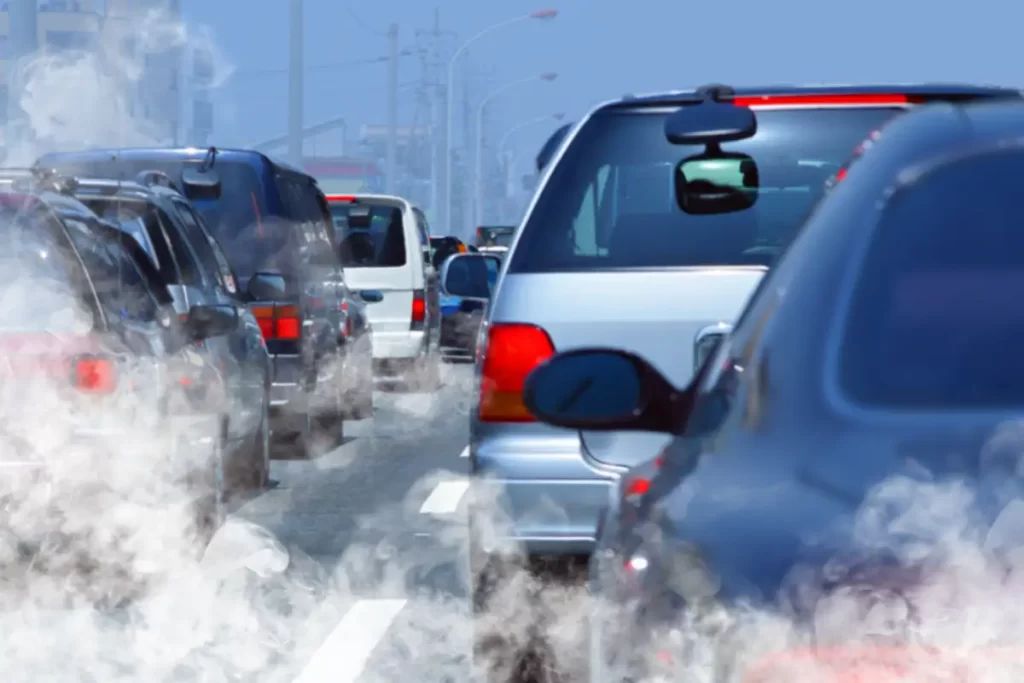 Car exhaust fumes in a traffic jam