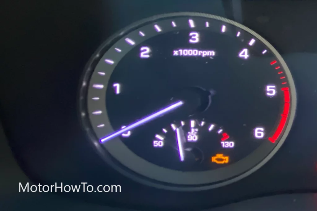 Engine check light on car dashboard