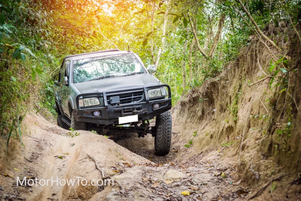 SUV driving off-road in dirt