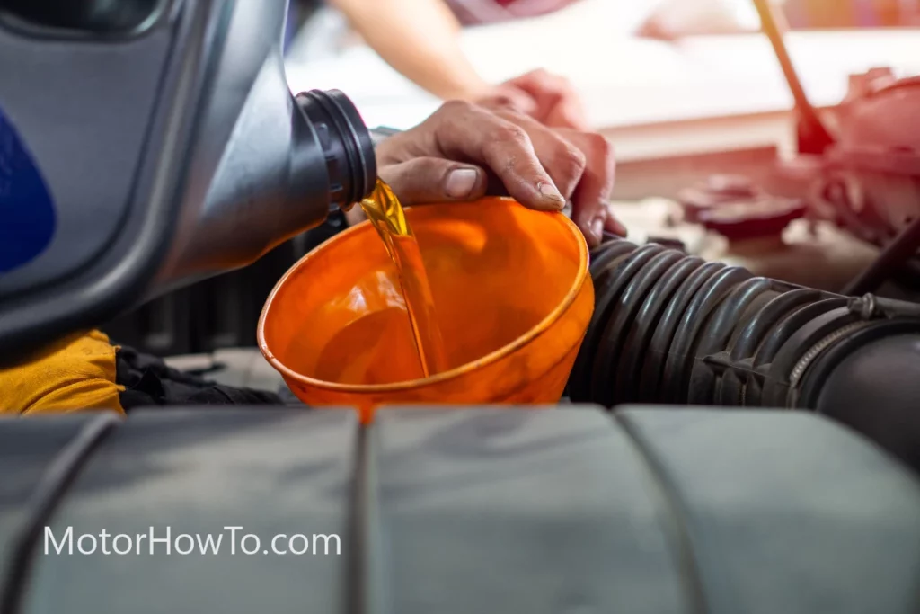 Duramax engine oil poured in pickup truck