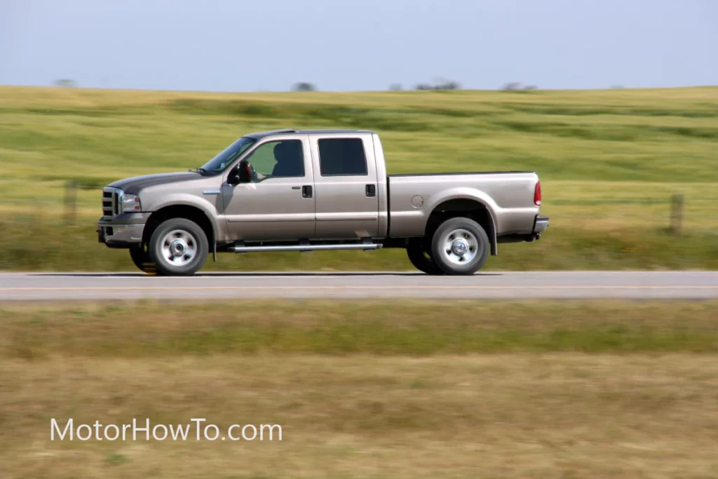 pick up truck speeding on road